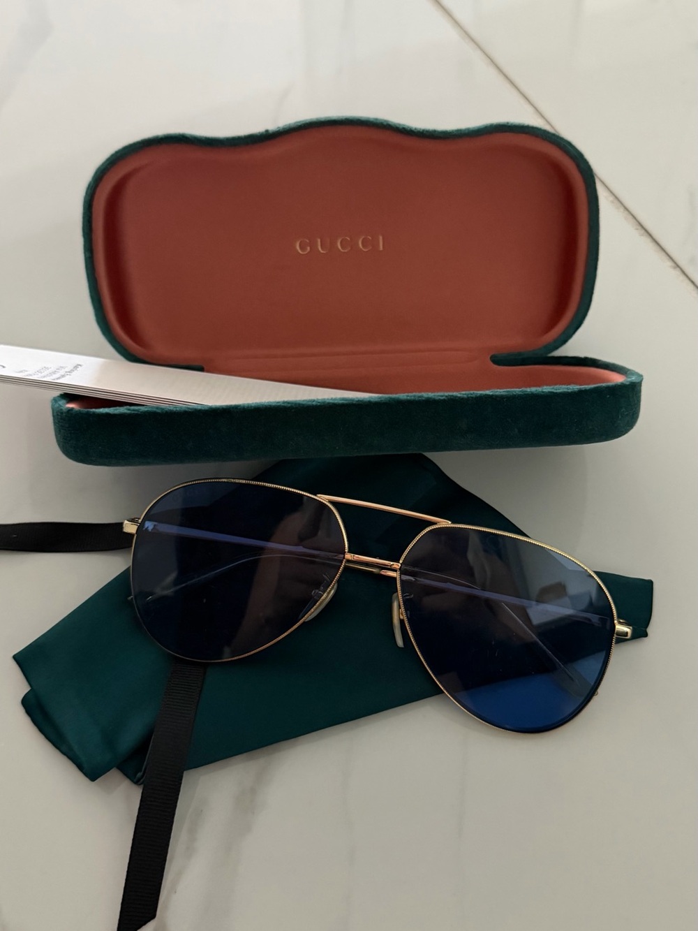 GUCCI Gold Frame Aviator Sunglasses with Blue Lenses